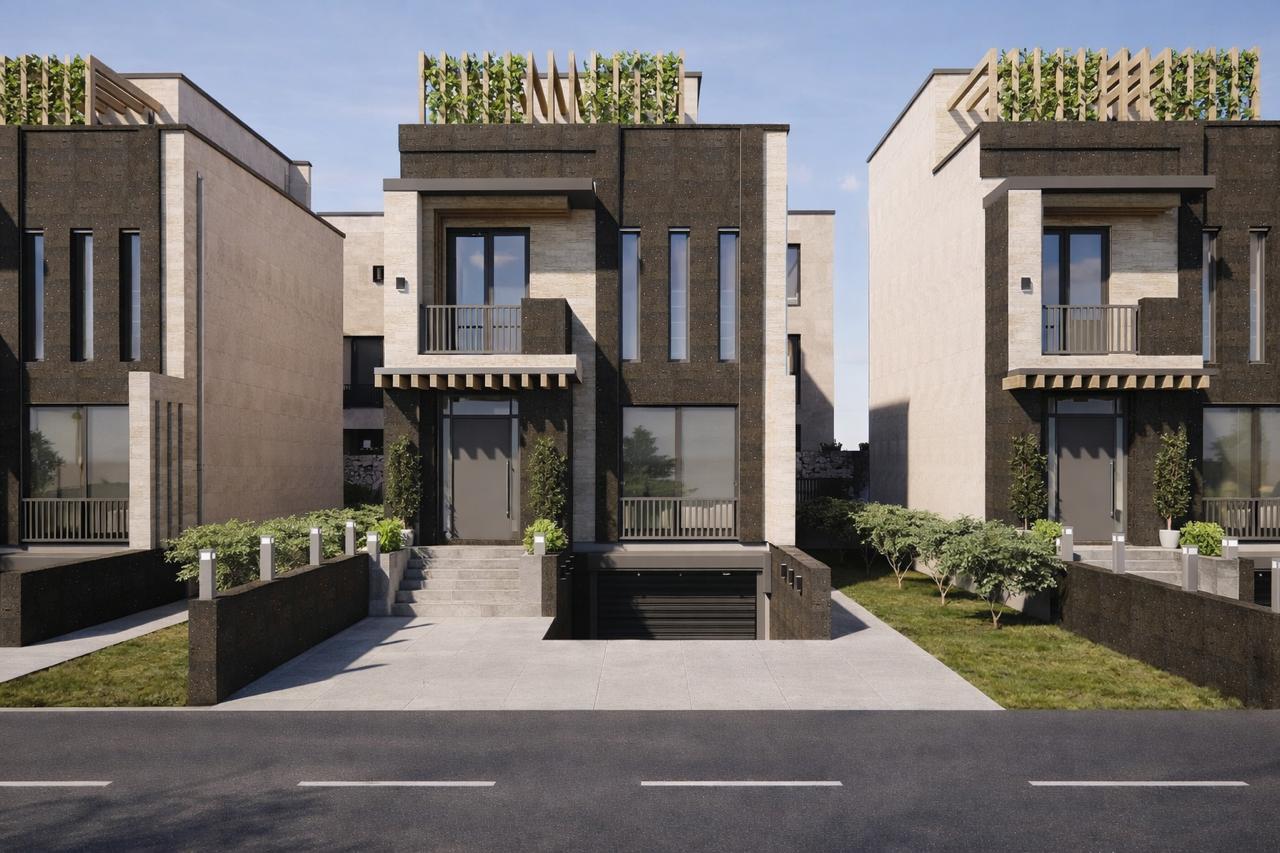 Symmetric townhouse facades neighboring the development